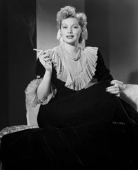 Lucille Ball smoking a cigar photo print in vintage style.