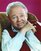 Carroll O'Connor photo print in red vest and white polo, 8x10.