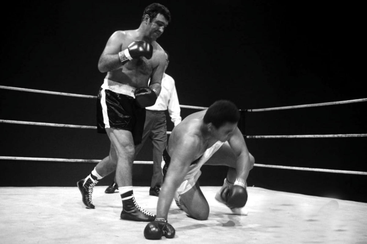 Muhammad Ali fighting Rocky Marciano photo print - iconic boxing image.