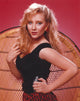 Elegant portrait of Anne Heche in a black dress photo print