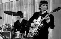 John Lennon playing guitar photo print in multiple sizes