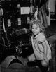 Shirley Temple squatting in dress vintage photo print.