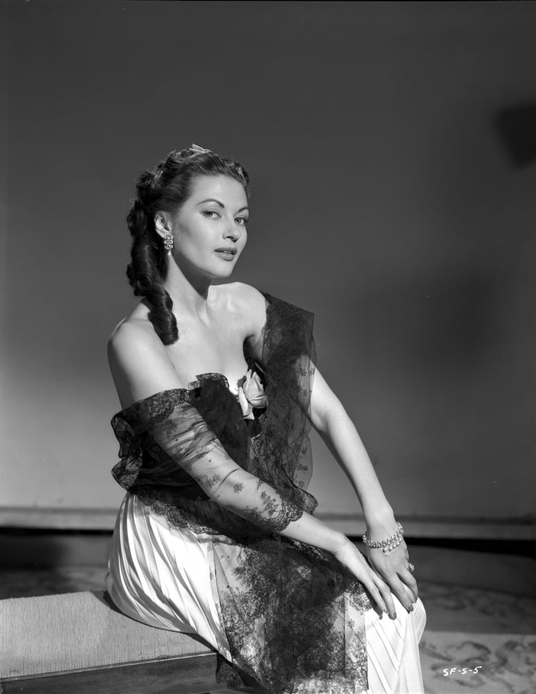 Yvonne De Carlo elegant pose in black strapless dress photo print