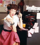 Lily Tomlin smiling phone photo print - available in multiple sizes.