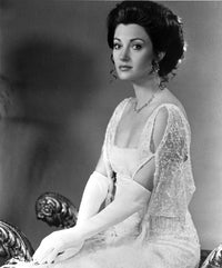 Elegant portrait of Jane Seymour in evening dress and gloves.