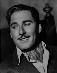 Errol Flynn iconic photo print showcasing classic Hollywood charm.