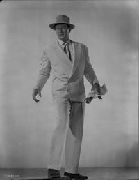 John Wayne photo print in white suit and pants.