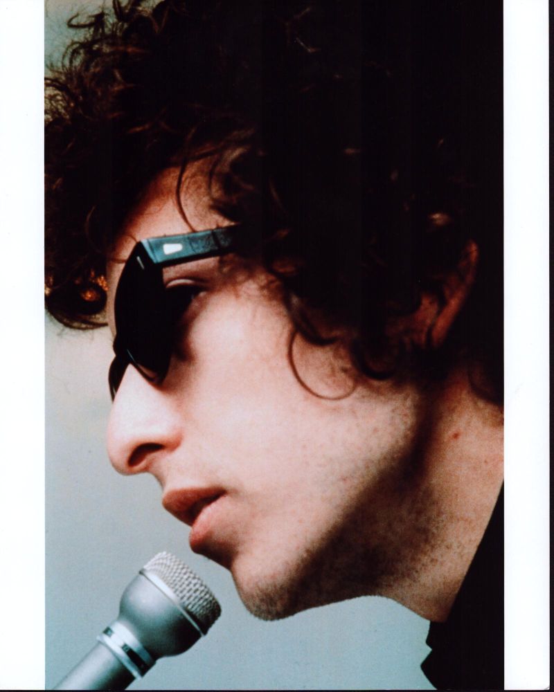Bob Dylan close-up photo print with sunglasses and microphone.