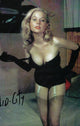 Betty Brosmer Stockings Photo Print showcasing vintage beauty.