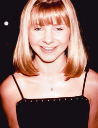 Beverley Mitchell photo print in black tank top, showing her casual elegance.