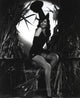 Ann Miller classic portrait photo print featuring sexy outfit with broom.