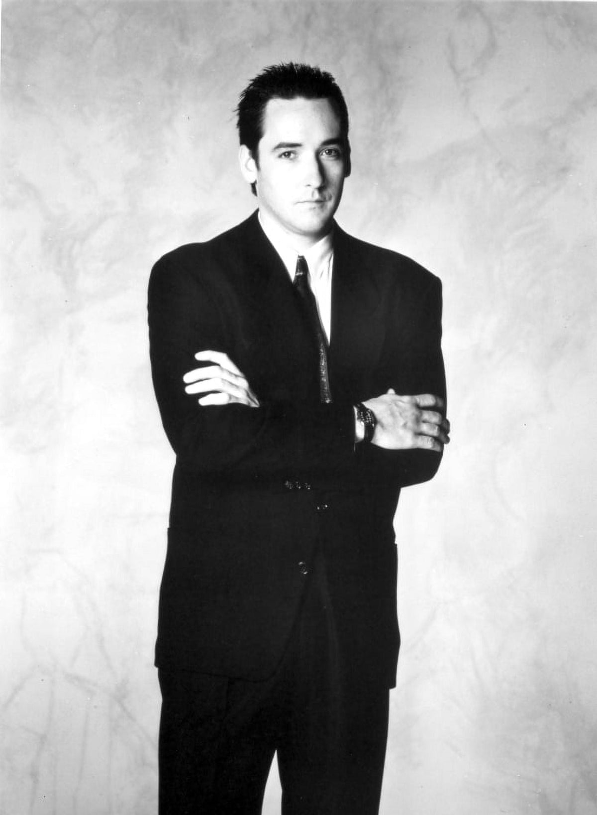 John Cusack in a suit photo print, available in multiple sizes.