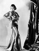Constance Bennett elegant in evening gown photo print by Adrian, 1935.