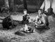 Johnny Weissmuller grilling food in a classic movie scene photo print.