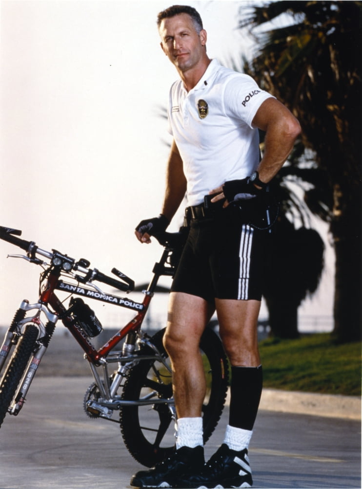 Rick Rossovich posed with mountain bike photo print