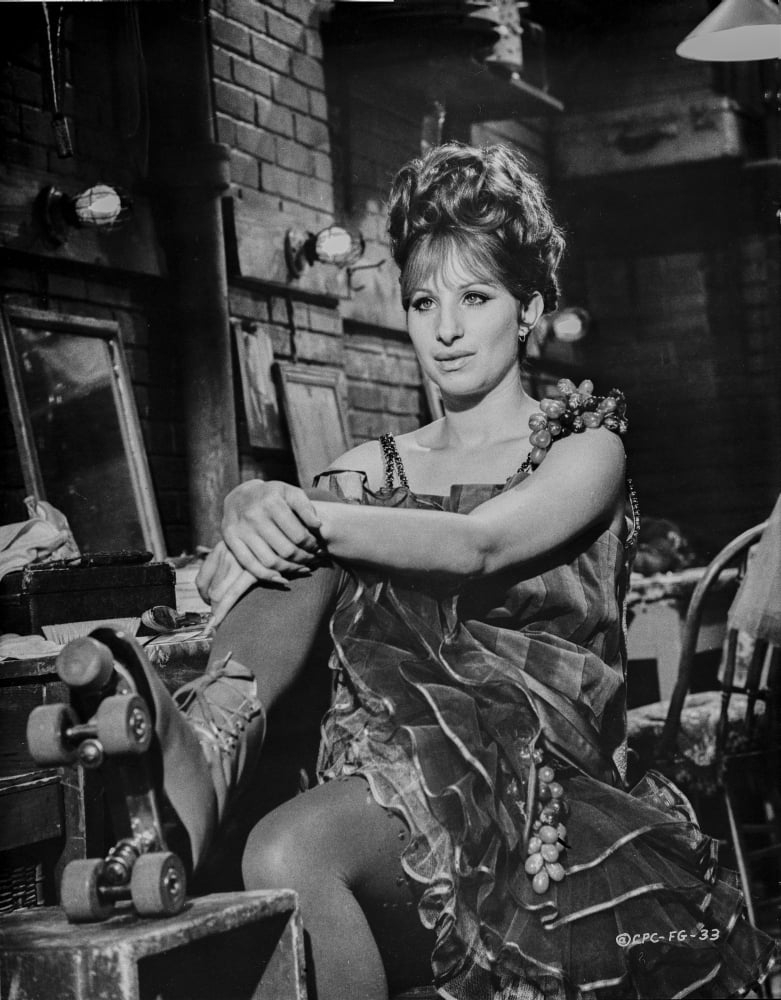 Barbra Streisand posed sitting on a chair photo print
