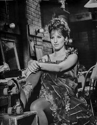 Barbra Streisand posed sitting on a chair photo print