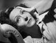 Gloria Swanson classic portrait photo print in lying pose.