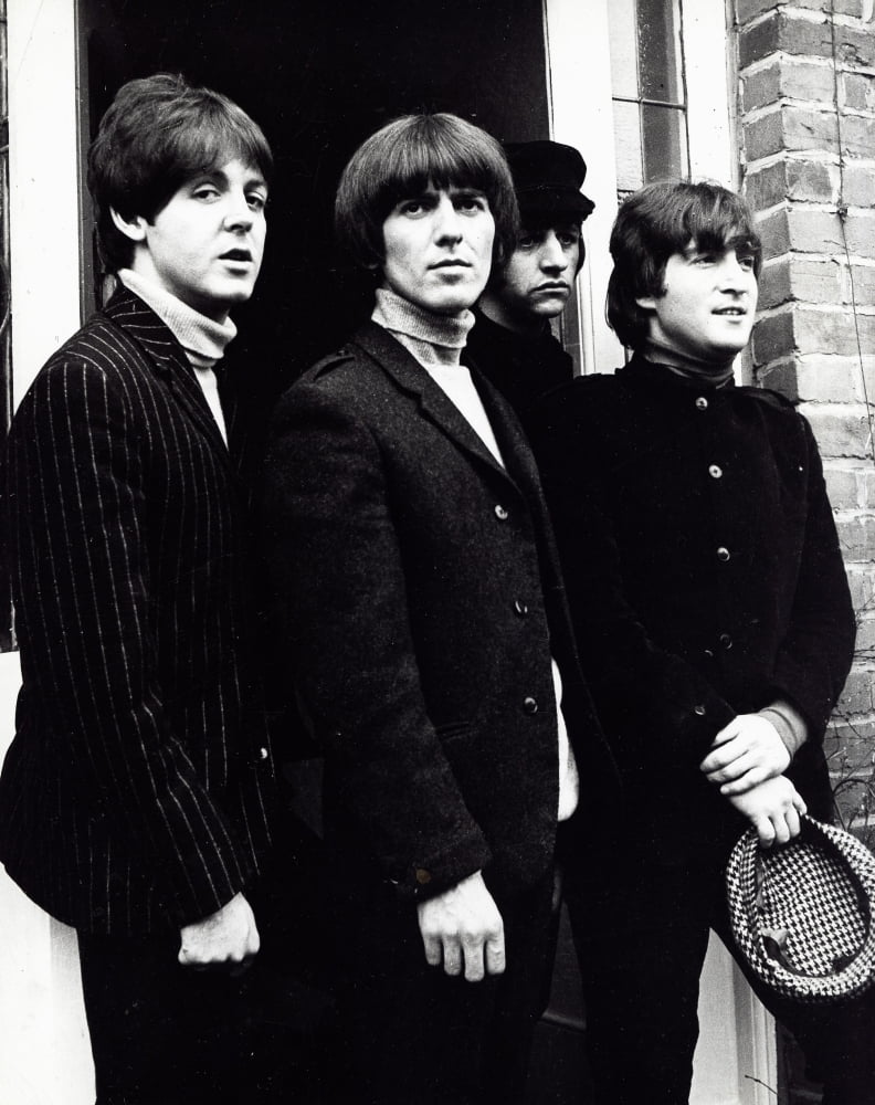 The Beatles iconic photo print featuring the legendary band.