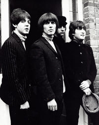 The Beatles iconic photo print featuring the legendary band.