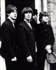 The Beatles iconic photo print featuring the legendary band.