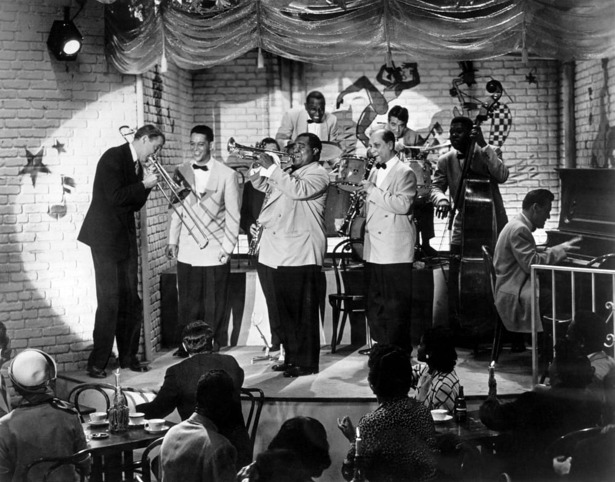 1954 photo print of The Glenn Miller Story featuring James Stewart and Louis Armstrong.