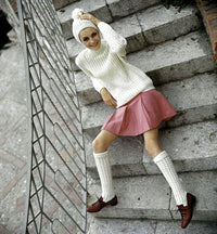 Twiggy sitting on a staircase photo print