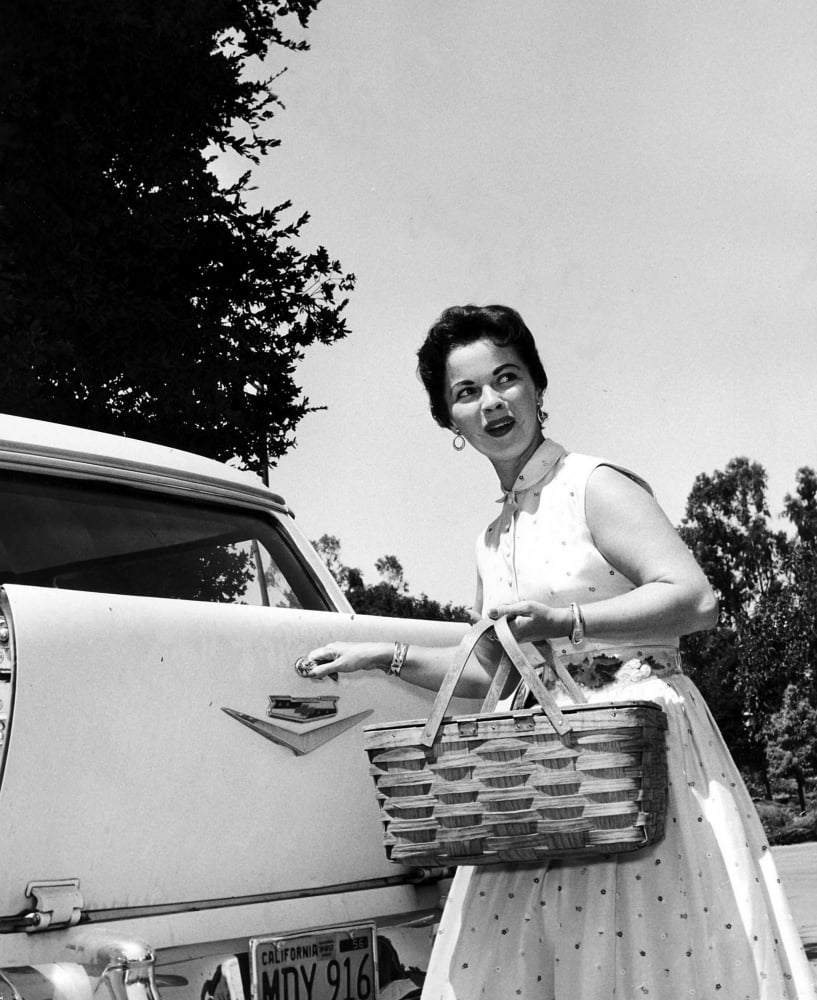 Shirley Temple holding a picnic basket photo print