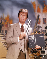 Dick Clark posed photo print in gray coat, classic entertainment image.