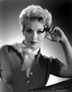 Kim Novak wearing a stylish scarf photo print