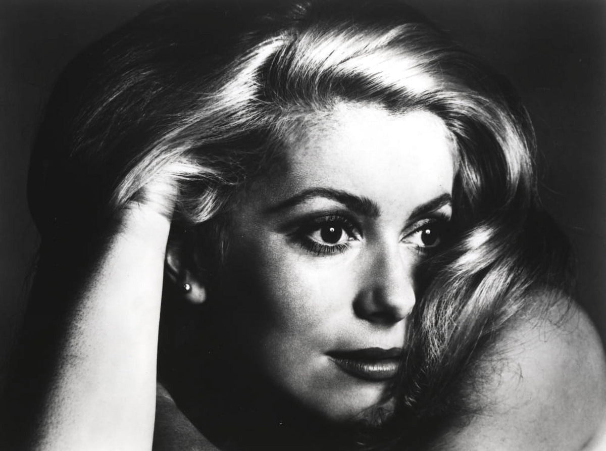 Catherine Deneuve close-up photo print showcasing the iconic actress.