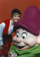 Sandy Duncan standing beside dwarf mascot photo print