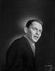 Frank Sinatra posed in suit with mouth slightly open photo print