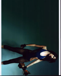 Juliette Lewis photo print in fishnets holding a trophy, available in multiple sizes.