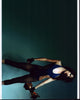 Juliette Lewis photo print in fishnets holding a trophy, available in multiple sizes.