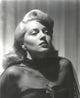 Close-up portrait of Lana Turner with closed eyes, photo print.