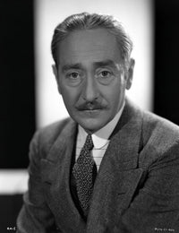 Portrait of Adolphe Menjou photo print showcasing classic Hollywood style.