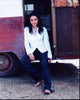 Norah Jones sitting in trailer doorway photo print