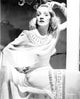 Marlene Dietrich posed elegantly in a white dress photo print.