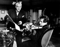 Sherlock Holmes and the Voice of Terror 1942 Photo Poster Print featuring Nigel Bruce and Basil Rathbone.