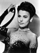 Lena Horne leaning in a black gown with long gloves photo print