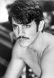 Eric Roberts shirtless photo print showcasing vintage style.