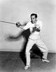 Basil Rathbone Fencing Portrait Poster Print showcasing classic cinema elegance.