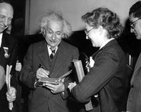 Albert Einstein signing an autograph photo print