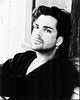 Richard Grieco black and white photo print leaning against wall