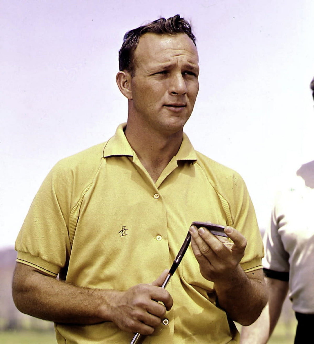 Arnold Palmer in Yellow Photo Print showcasing classic golf style.