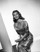 Rita Hayworth posed photo poster print in shimmering gown.