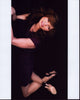 Michaela Conlin photo print in purple dress and heels