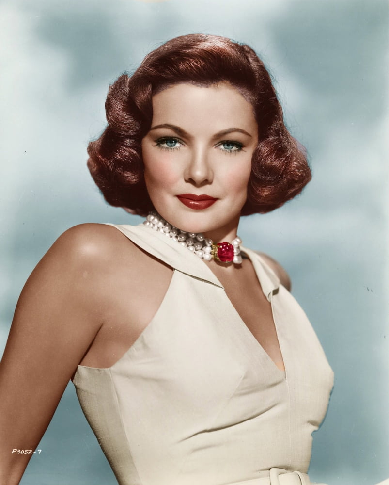 Gene Tierney photo print featuring red jewel necklace and white top