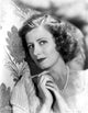Irene Dunne photo print in elegant dress wearing pearl necklace